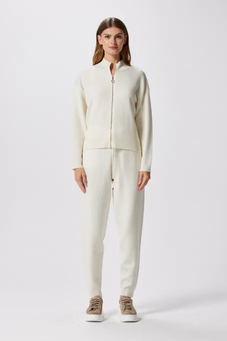 Pantaloni crem din lână merinos